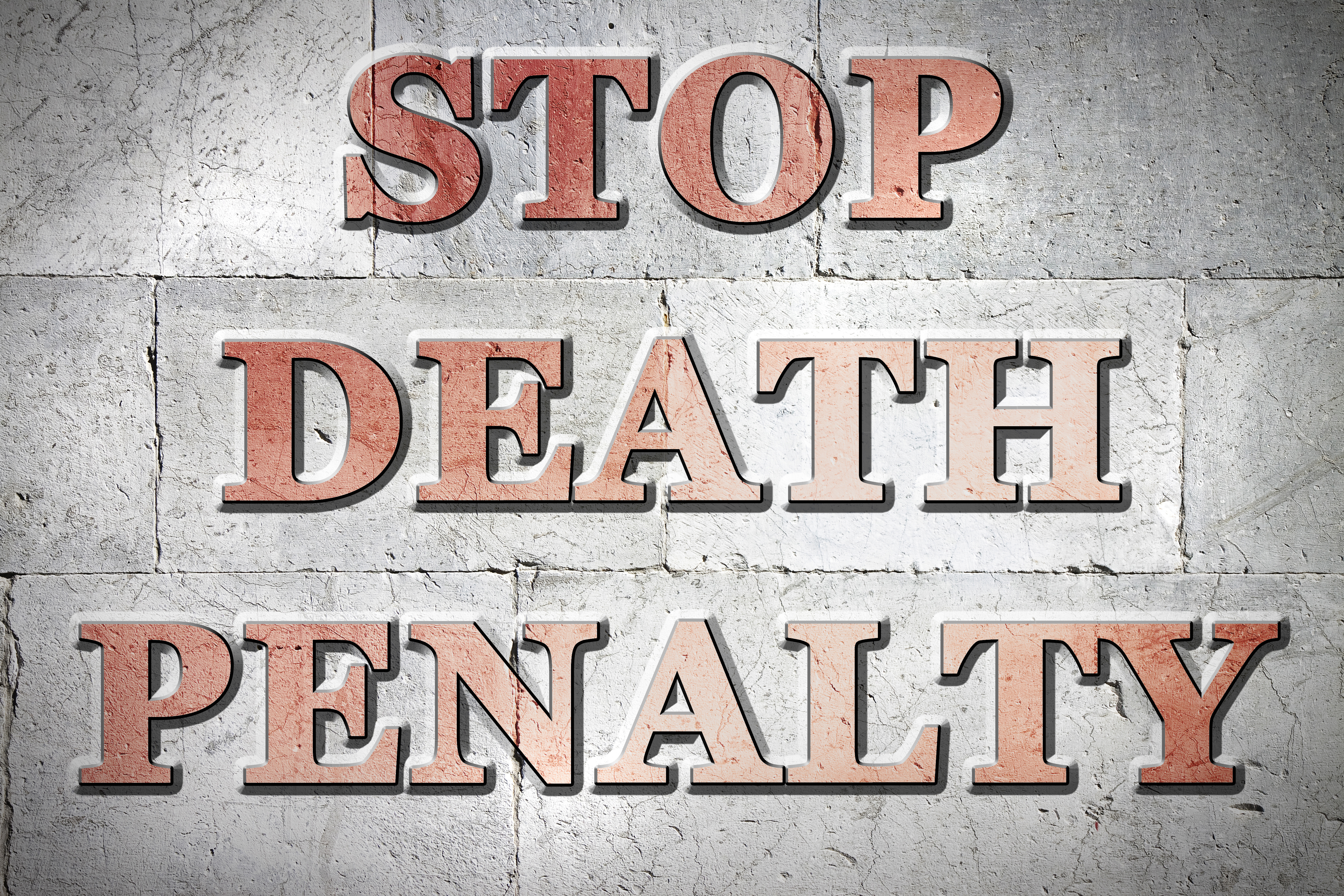 Stop death penalty engraved on a stone wall - concept image
